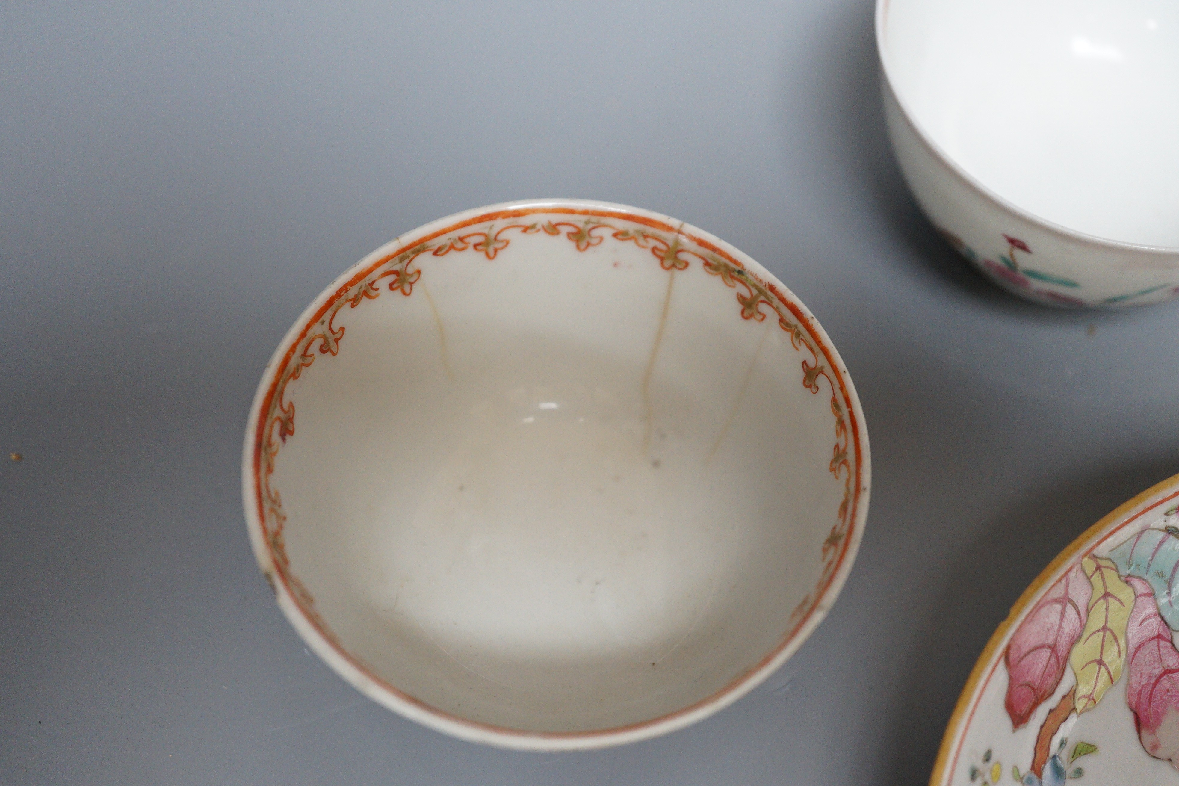 A 19th century Chinese Tobacco Leaf pattern saucer and four various teabowls